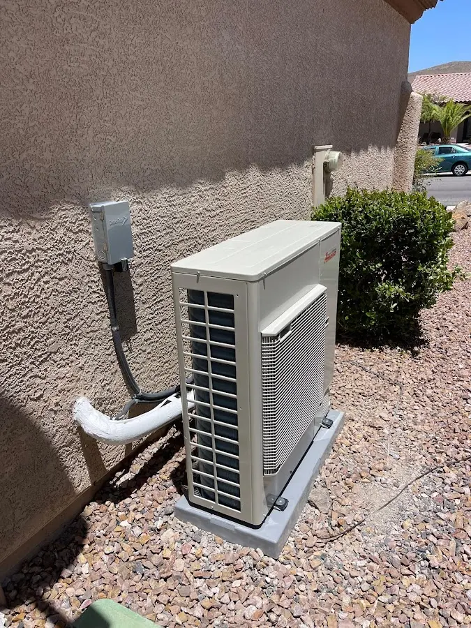 Residential air conditioning condenser unit in Strawberry